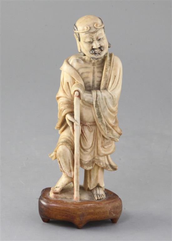 A Chinese carved soapstone figure of Li Tieguai, 18th century, overall height 18cm